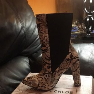 Black and white snake print boots